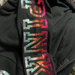 Pink fleece sweatshirt with glitter pink letters on sleeve